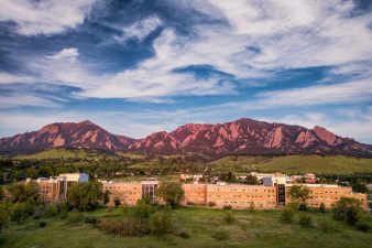 late Spring sunrise, NOAA Boulder David Skaggs Research Center and the Flatirons by Chuck Rasco Photography